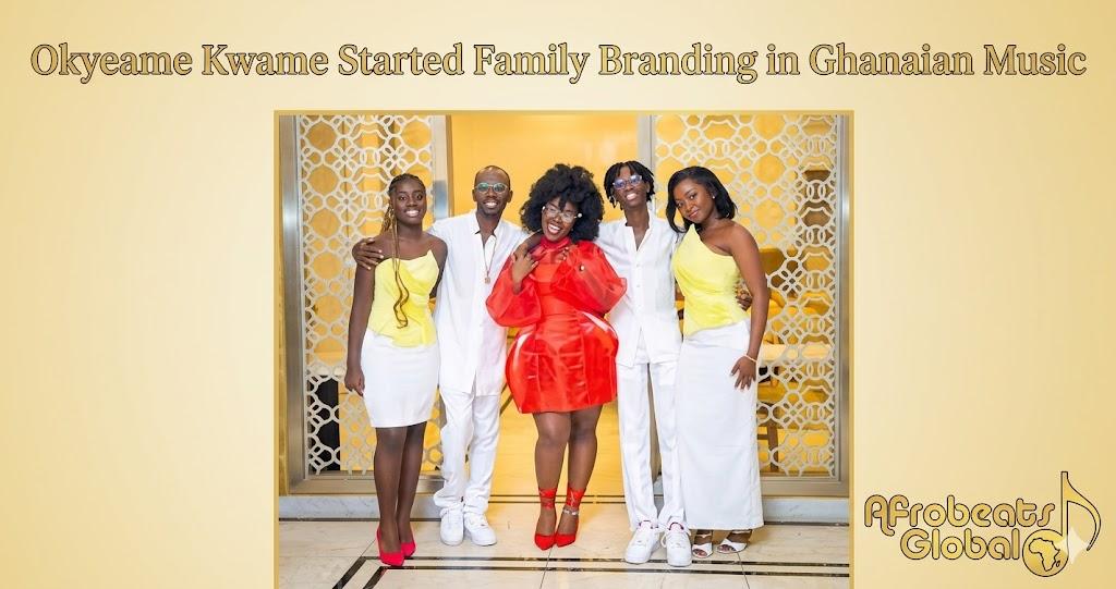 Okyeame Kwame posing with his family in a promotional photo