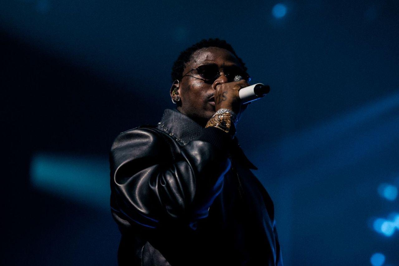 Asake performing live during an exclusive Spotify-backed M$NEY album showcase in London, entertaining fans with songs from his chart-topping project.